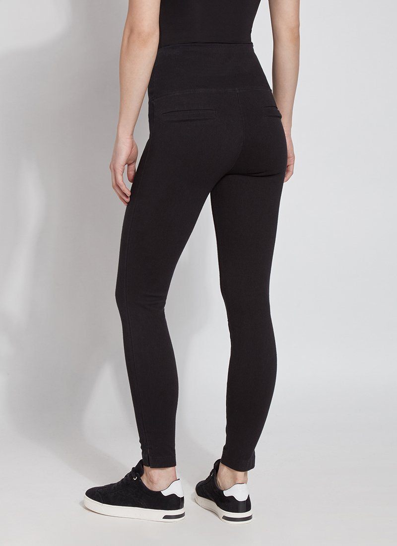 color=Black, back view, plus size denim skinny jean leggings with concealed smoothing waistband for flattering fit