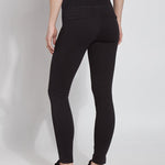 color=Black, back view, plus size denim skinny jean leggings with concealed smoothing waistband for flattering fit