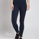 color=Indigo, front view, plus size denim skinny jean leggings with concealed smoothing waistband for flattering fit