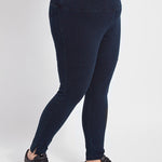 color=Indigo, side view, plus size denim skinny jean leggings with concealed smoothing waistband for flattering fit