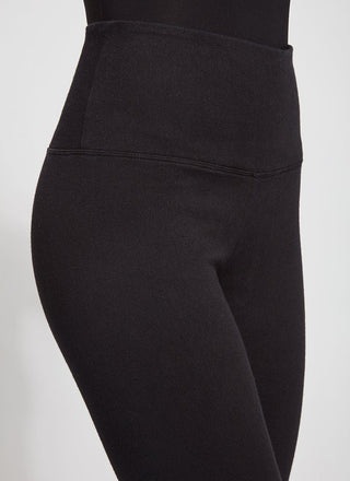 color=Black, Angled detailed shot of front right hip, black cotton and spandex leggings with concealed slimming signature waistband