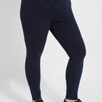 color=Indigo, front view, ankle length denim jean leggings with concealed waistband for flattering, slimming fit, best selling jegging