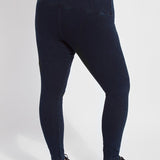 color=Indigo, back view, ankle length denim jean leggings with concealed waistband for flattering, slimming fit, best selling jegging