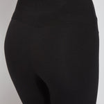 color=Black, Detailed rear view of black flattering cotton crop leggings with concealed waistband for control and comfort