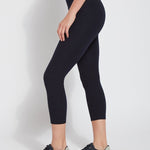 color=Midnight, Side view of midnight blue flattering cotton crop leggings with concealed waistband for control and comfort