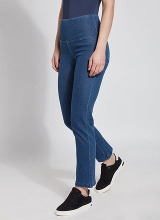 color=Mid Wash, Angled side view mid wash blue denim straight leg jean leggings with patented concealing waistband