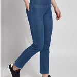 color=Mid Wash, Angled front view of mid wash blue denim straight leg jean leggings with patented concealing waistband, seen from waist down