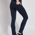 color=Indigo, Angled rear view of indigo denim straight leg jean leggings with patented concealing waistband